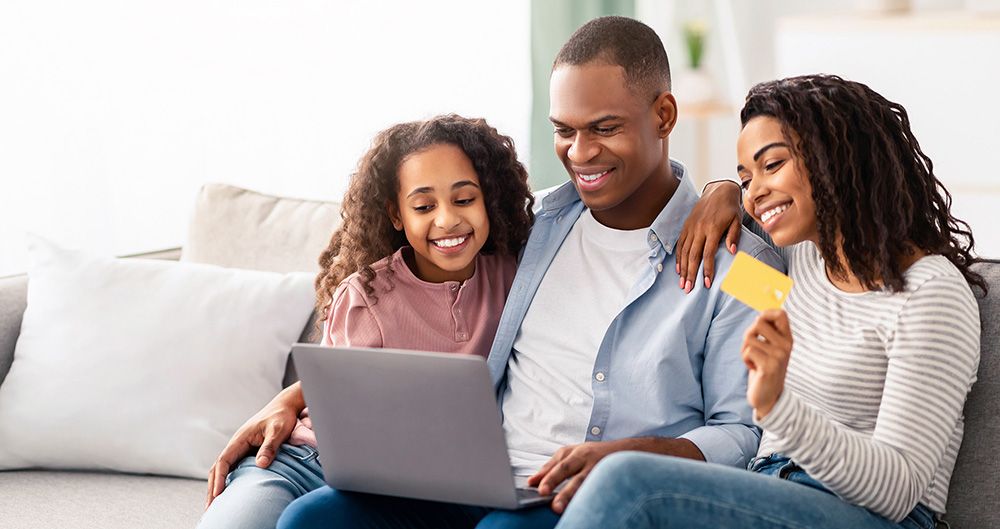 Family online with laptops